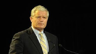 group of black people with one white man on the right