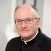 Priest posed for Photo