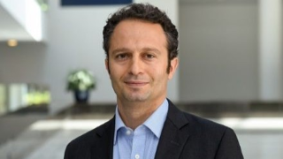White man wearing a suit
