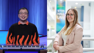 Asian man and white woman smiling side by side