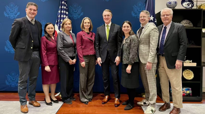 group of white people posing