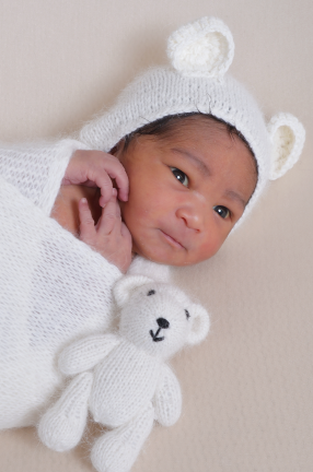 black baby in a bunny suit