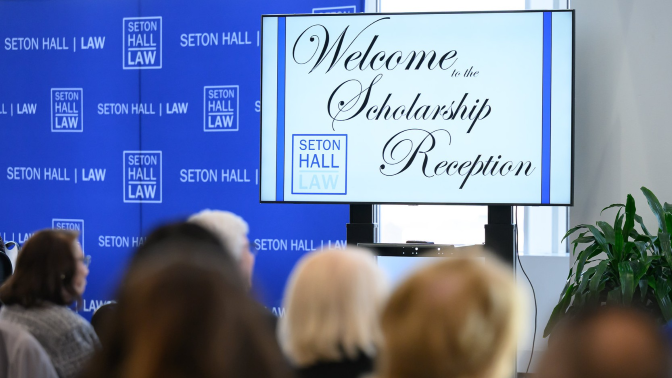 A white sign against blue backdrop