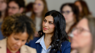 woman in the middle of a crowd