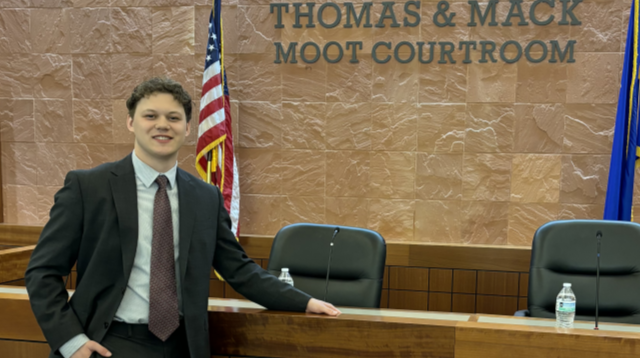 man wearing suit standing