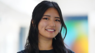 Asian woman smiling with dimples