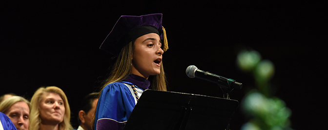 Bernadette Menendez, J.D. '24 singing the Alma Mater at Commencement 2024