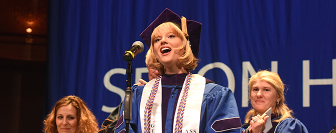 Soloist singing The Star-Spangled Banner at Commencement