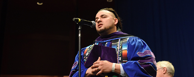 Justin Perez, J.D. ’24 singing The Star-Spangled Banner at Commencement