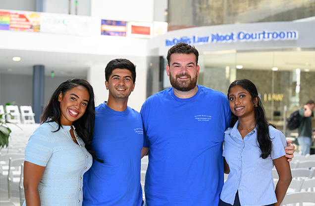 Students standing together smiling